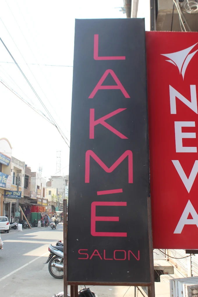 Lakme Salon for Him Her Moga logo 2