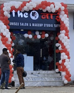 The Nai Unisex Salon Prayagrajlogo